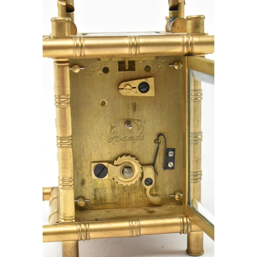 105 - Elliott & Son, London - a Victorian Aesthetic Movement 19th century brass carriage clock. The brass ... 