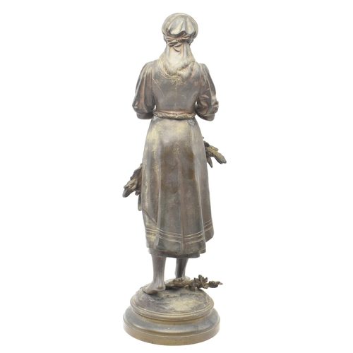 106 - A French 19th century bronze figurine of a lady attributed to Eutrope Bouret. The figurine modelled ... 
