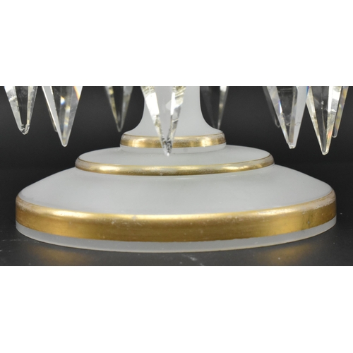 107 - A Victorian Bohemian 19th century white opaline glass candlestick lustre. The lustre having gilded r... 