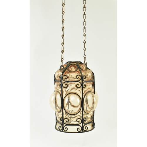 108 - A French inspired early 20th century amber hand blown glass bubble porch lantern light. The lantern ... 