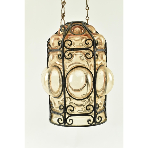 108 - A French inspired early 20th century amber hand blown glass bubble porch lantern light. The lantern ... 