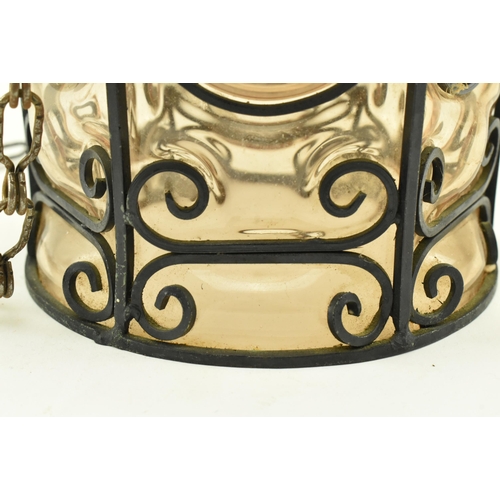 108 - A French inspired early 20th century amber hand blown glass bubble porch lantern light. The lantern ... 