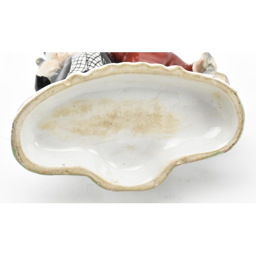 114 - A Victorian 19th century Staffordshire pottery figural group of ' The Parson and Clerk '. The figure... 