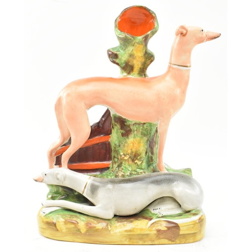 115 - A Victorian late 19th century circa 1880s Staffordshire spill holder vase. The vase in the form of t... 