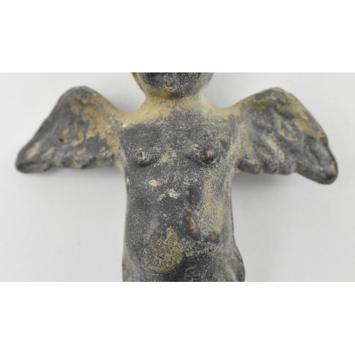117 - A believed Ancient Roman circa 2nd century cherub figurine. The idol figure with twin wings, raised ... 