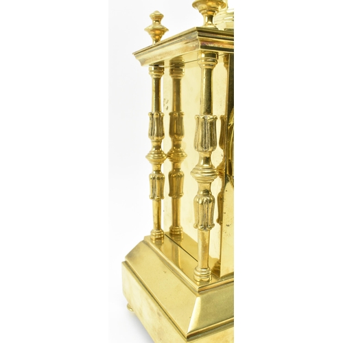 118 - Japy Freres, Paris - a French Gothic Revival 19th century brass mantel clock. The mantle clock havin... 