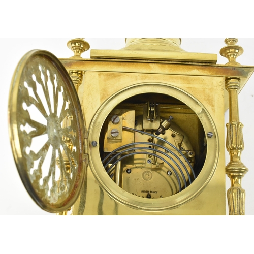 118 - Japy Freres, Paris - a French Gothic Revival 19th century brass mantel clock. The mantle clock havin... 
