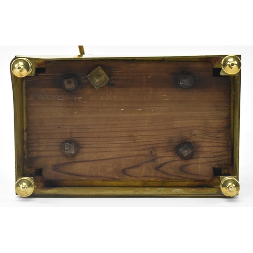 118 - Japy Freres, Paris - a French Gothic Revival 19th century brass mantel clock. The mantle clock havin... 