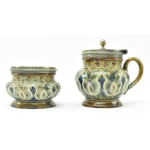 63 - Doulton Lambeth - a Victorian late 19th century circa 1883 stoneware glazed ceramic cruet set. The s... 