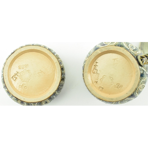 63 - Doulton Lambeth - a Victorian late 19th century circa 1883 stoneware glazed ceramic cruet set. The s... 