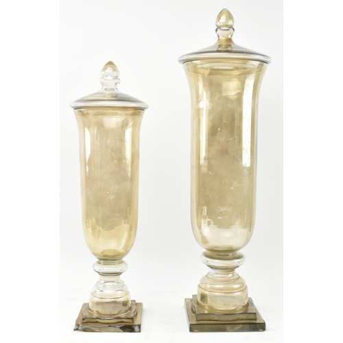 64 - A pair of early 20th century circa 1900 lustre glass confectionery shop display lidded vases / jars.... 