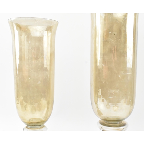 64 - A pair of early 20th century circa 1900 lustre glass confectionery shop display lidded vases / jars.... 