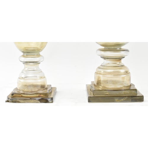 64 - A pair of early 20th century circa 1900 lustre glass confectionery shop display lidded vases / jars.... 