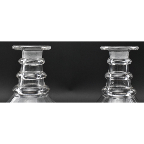 72 - A pair of George III early 19th century circa 1820 cut glass decanters. Each decanter decorated with... 
