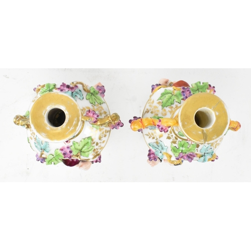 74 - A pair of large believed French continental early 20th century hand painted fine bone china scent bo... 