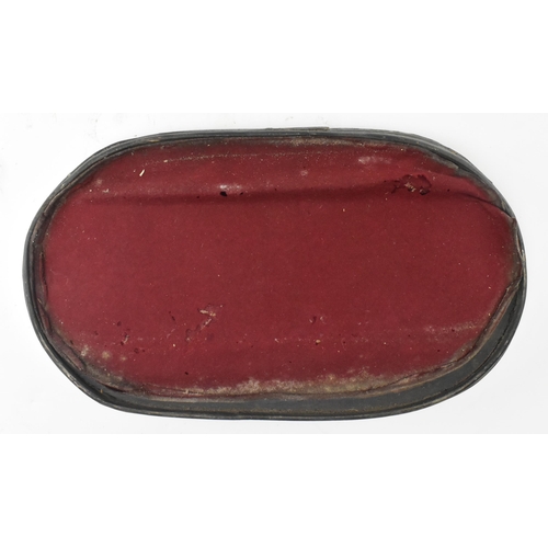 76 - An early 20th century glass dome. The large glass dome raised on a wine colour fabric lined black wo... 