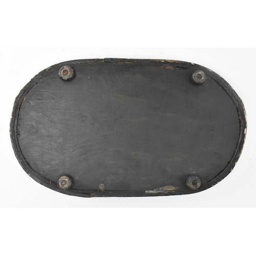 76 - An early 20th century glass dome. The large glass dome raised on a wine colour fabric lined black wo... 