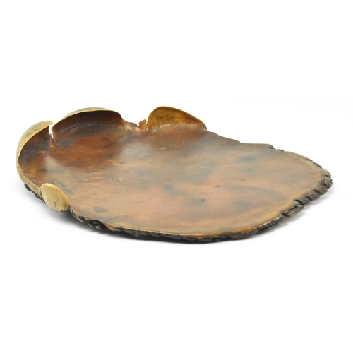 77 - A late 19th / early 20th century believed lacquered elephant's foot / sole. Measures approx. 6cm x 4... 