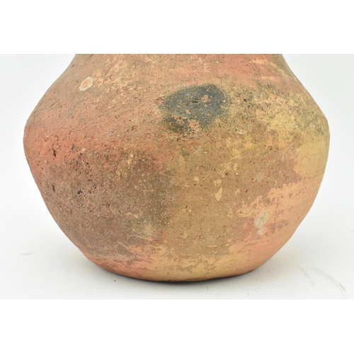 85 - A Mesopotamia large Roman / North African/ Greek/ terracotta storage amphora. The bulbous shaped bod... 