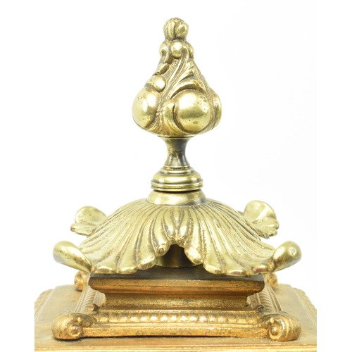 86 - A French late 19th - early 20th century gilt metal two train mantel clock. The mantle clock featurin... 