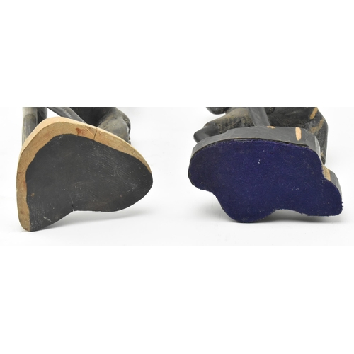 92 - Two Makonde People Tanzanian hand carved wood tribal indigenous sculptures figures. The lot to inclu... 