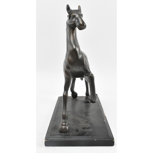 94 - A 20th century lost wax bronze sculpture figure of galloping horse. The figure depicting a horse wit... 
