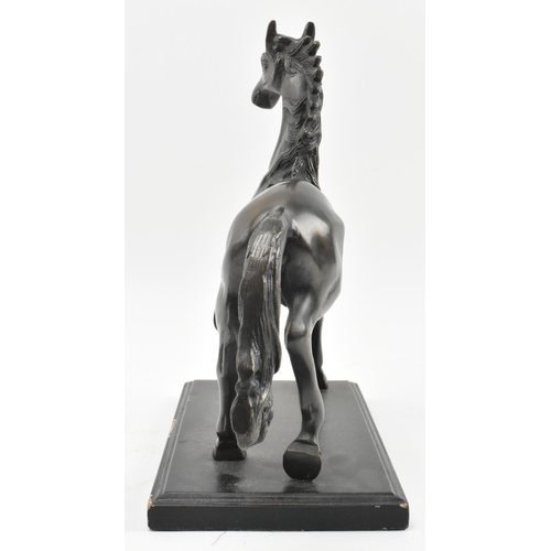 94 - A 20th century lost wax bronze sculpture figure of galloping horse. The figure depicting a horse wit... 