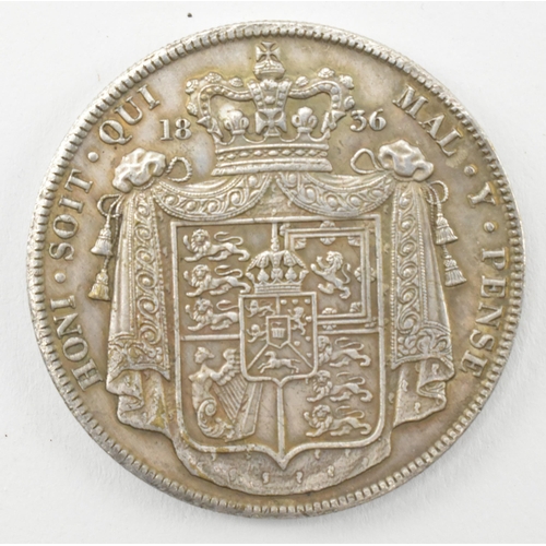 95 - WITHDRAWN - A 1836 William IV silver crown coin. The coin obverse with Bare William IV facing right.... 