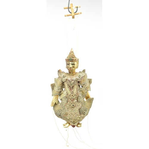 98 - A Burmese Oriental 20th century glass and sequin-adorned gilt wood marionette of possibly a Buddhist... 