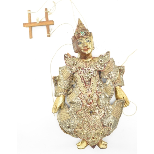 98 - A Burmese Oriental 20th century glass and sequin-adorned gilt wood marionette of possibly a Buddhist... 