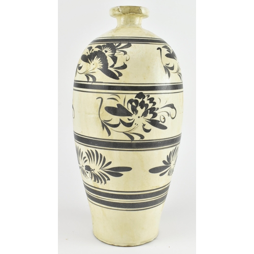 111 - A Chinese Cizhou meiping vase. The meiping vase modelled a short neck with everted rim, the body cov... 