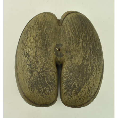 73 - An unpolished Coco de Mer (Lodoicea Maldivica) nut with cut top. Measures approx. 17cm x 33cm x 27cm... 