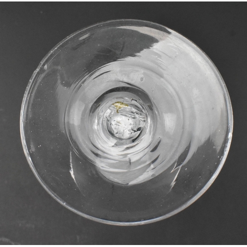 71 - A George III mid 18th century hand blown lead glass double series opaque twist stem wine glass. The ... 