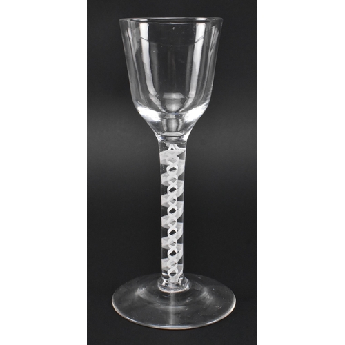 87 - A George III mid 18th century hand blown lead glass double series opaque twist stem cordial glass. T... 