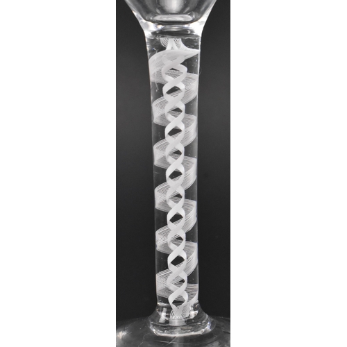 87 - A George III mid 18th century hand blown lead glass double series opaque twist stem cordial glass. T... 