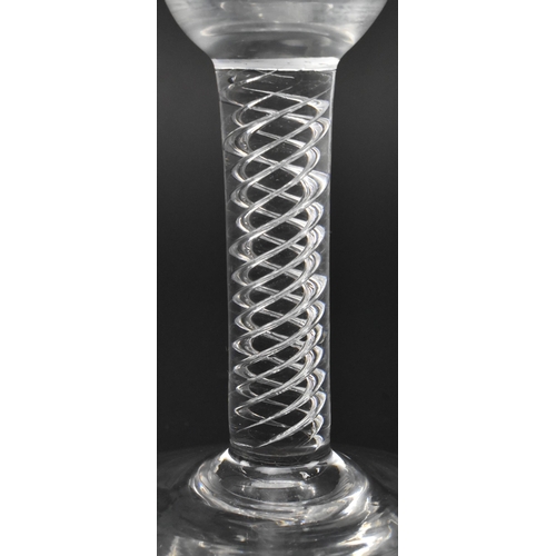 97 - A George III late 18th century hand blown lead glass double series air twist stem wine glass. The gl... 