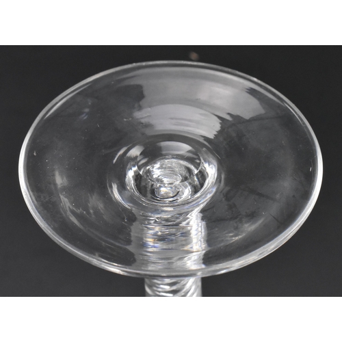 97 - A George III late 18th century hand blown lead glass double series air twist stem wine glass. The gl... 