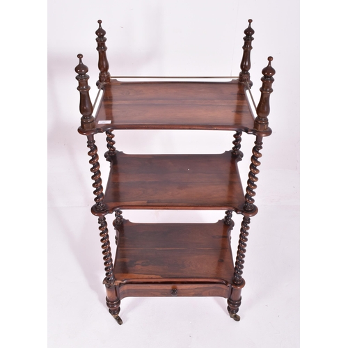 252 - A William IV early 19th century rosewood three tier whatnot etagere. The whatnot having four turned ... 