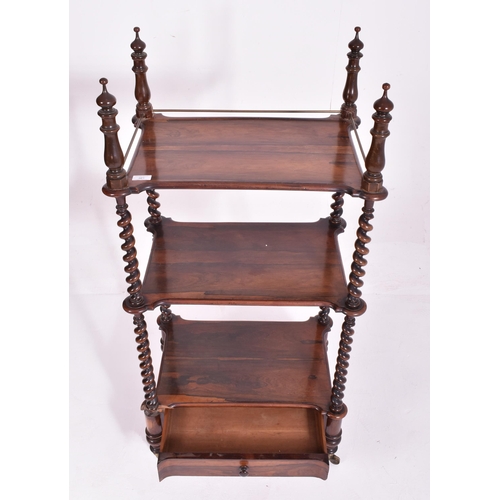 252 - A William IV early 19th century rosewood three tier whatnot etagere. The whatnot having four turned ... 