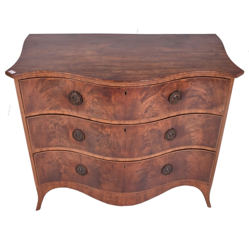 260 - A George III late 18th / early 19th century flame mahogany serpentine front chest of drawers. The ch... 