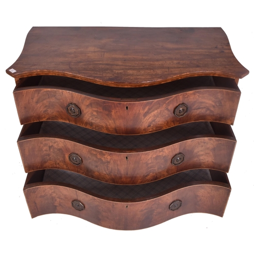 260 - A George III late 18th / early 19th century flame mahogany serpentine front chest of drawers. The ch... 