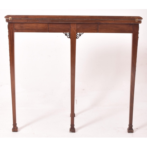 266 - An Adams Revival early 20th century mahogany demi-lune side hall table. The table having a half mood... 