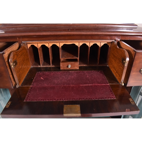 267 - A Victorian 19th century mahogany veneered & brass bound campaign chest on chest tallboy. The chest ... 