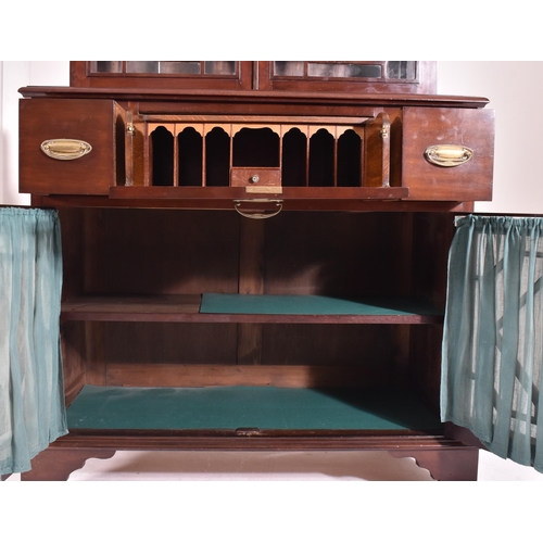 272 - A George III early 19th century mahogany & glazed library bookcase cabinet. The bookcase having an a... 