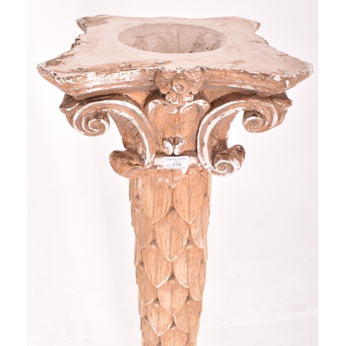 276 - A pair of 20th century plaster Classical style columns with capitals. Each having a Corinthian style... 