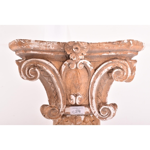 276 - A pair of 20th century plaster Classical style columns with capitals. Each having a Corinthian style... 