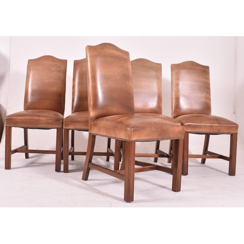 279 - A set of fourteen Gainsborough style studded brown leather and mahogany high back dining chairs. Eac... 