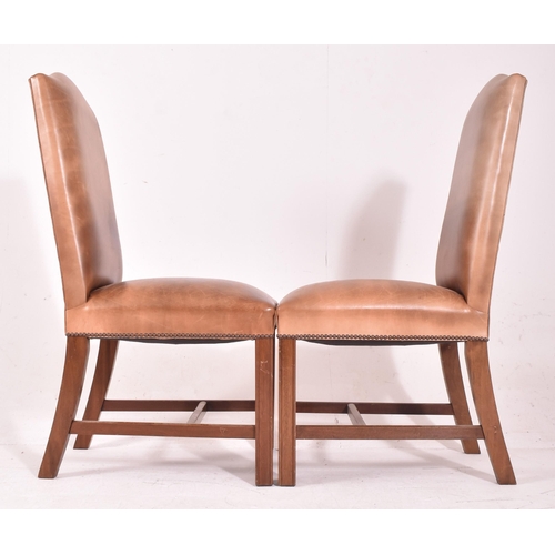 279 - A set of fourteen Gainsborough style studded brown leather and mahogany high back dining chairs. Eac... 