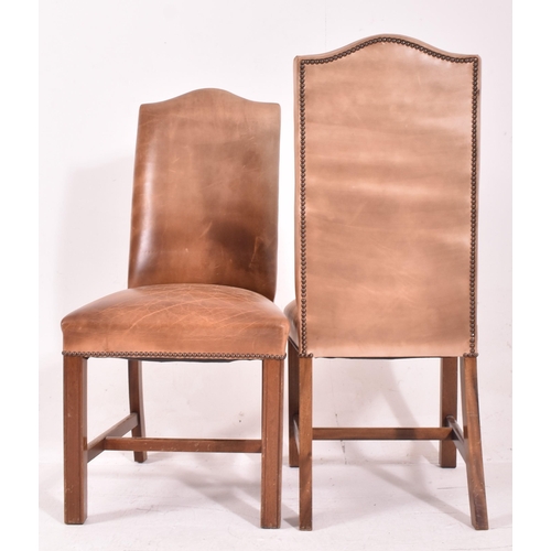 279 - A set of fourteen Gainsborough style studded brown leather and mahogany high back dining chairs. Eac... 