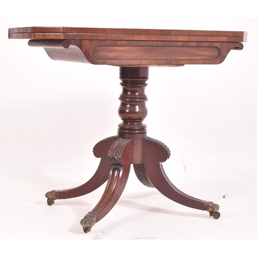 281 - A 19th century William IV Regency mahogany games / card table. The fold over swivel top supported by... 